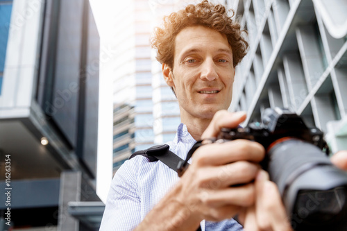 Male photographer taking picture