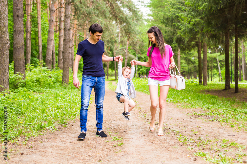 Happy family having fun outdoors and smiling Happy family having fun outdoors and smiling