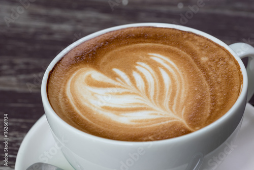 A cup of coffee with latte art.