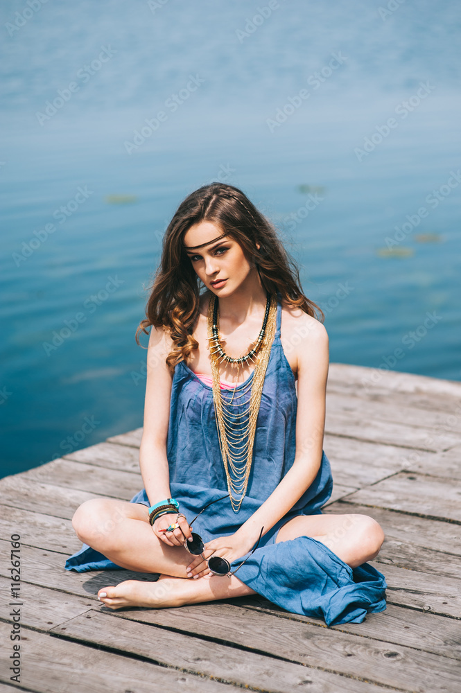 hippie girl on the dock