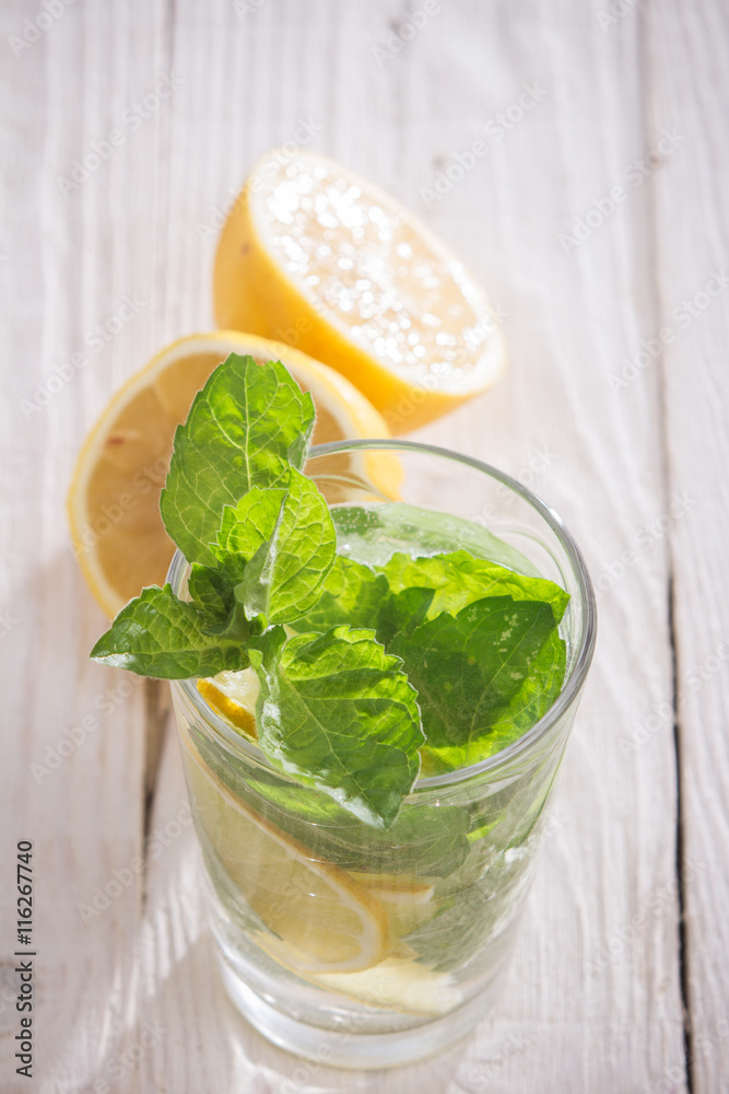 Soft drink with lemon, ice and mint Soft drink with lemon, ice and mint
