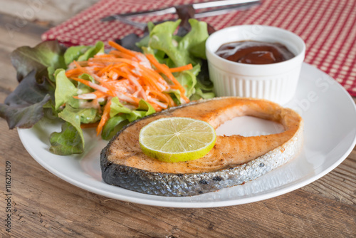 Grilled Salmon with fresh salad.