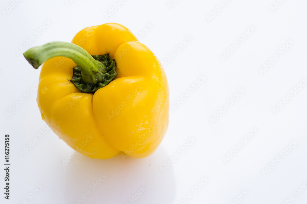 Ripe yellow bell peppers. Isolated on white background Ripe yellow bell peppers. Isolated on white background