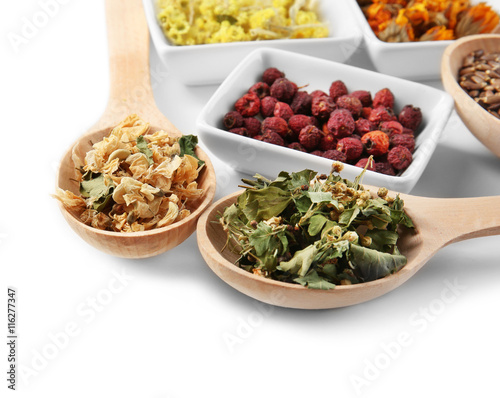 Natural flower and herb selection isolated on white photo