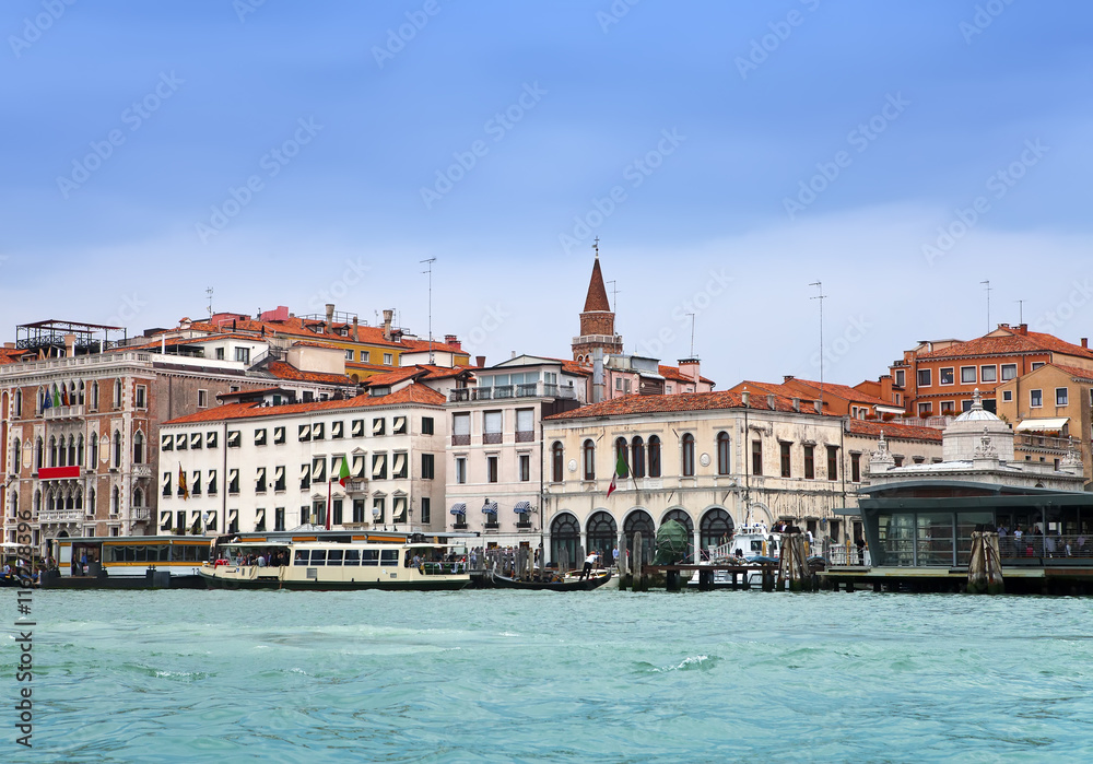 Venice. Italy. Bright ancient houses along Canal Grande..