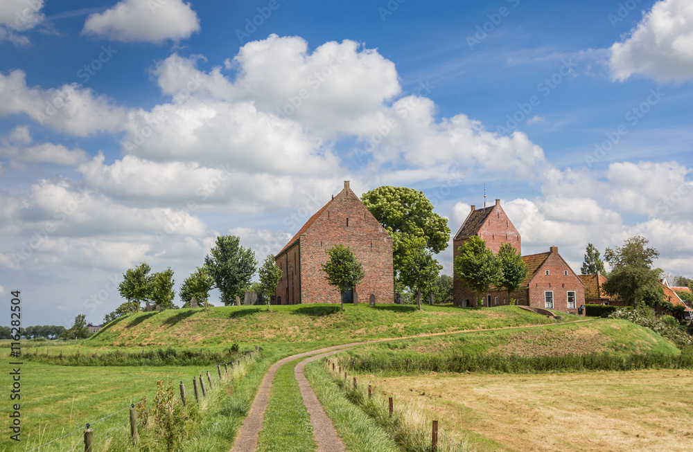 Medieval church on a mound in Groningen village Ezinge