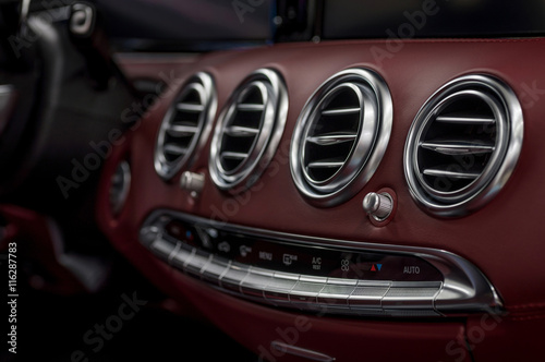 Luxury car interior details. © alexdemeshko