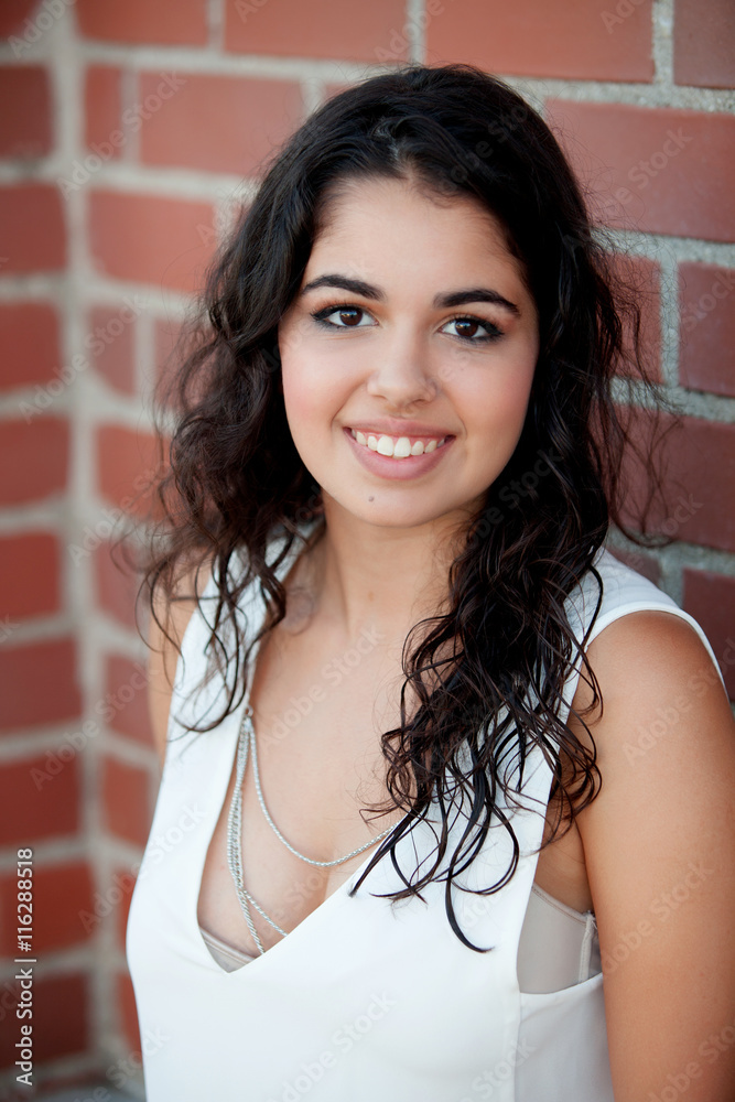 Beautiful brunette girl at the street