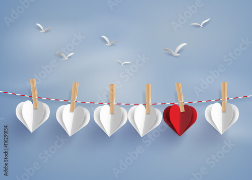 paper heart shape hanging on the lope