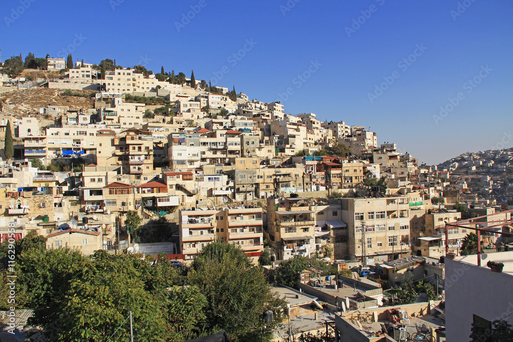 Homes on a hillside in Israel as seen from near the old city of Jerusalem.