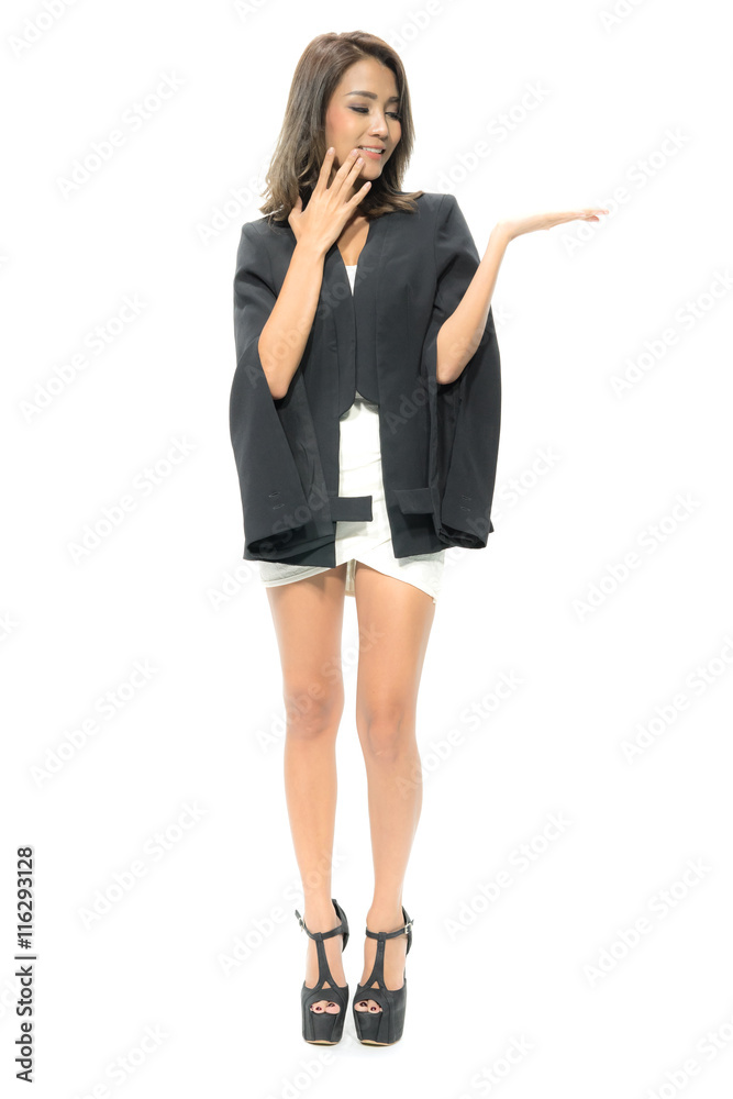 Beautiful Young Asian Businesswomen smiling happy presenting with open hand showing empty copy space. Female model isolated on white background. Beautiful Young Asian Businesswomen smiling happy presenting with open hand showing empty copy space. Female model isolated on white background.