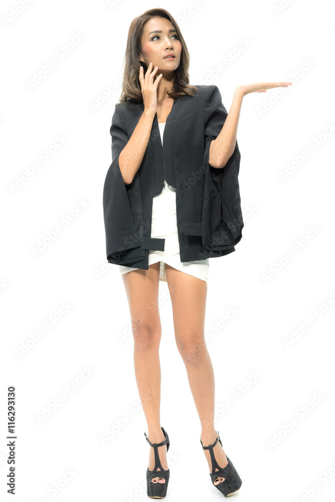 Beautiful Young Asian Businesswomen smiling happy presenting with open hand showing empty copy space. Female model isolated on white background. Beautiful Young Asian Businesswomen smiling happy presenting with open hand showing empty copy space. Female model isolated on white background.
