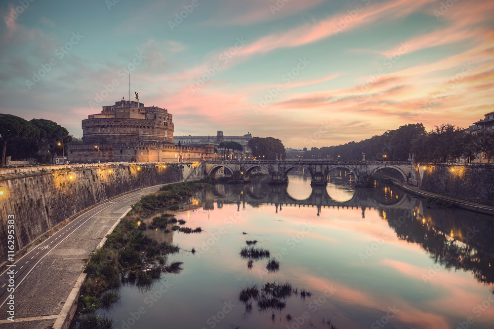 The fortress of Sant'Angelo (Castel Sant'Angelo) and bridge over river Tiber (Fiume Tevere) at a spectacular sunrise, Rome, Italy, Europe, vintage filtered style