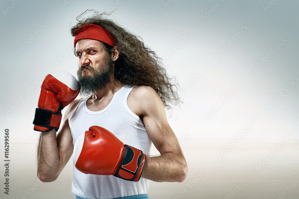 Funny boxer wearing red boxing gloves Stock Photo | Adobe Stock