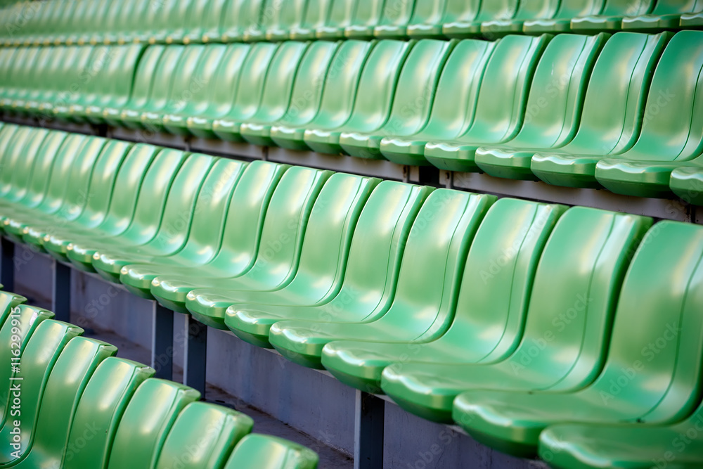 Obraz premium empty football stadium chairs