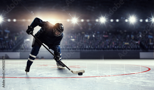 Hockey player on ice   . Mixed media photo