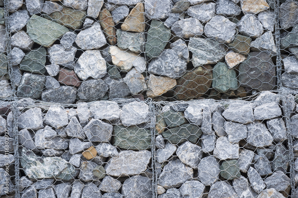 Stone walls in net prevent landslides Stone walls in net prevent landslides