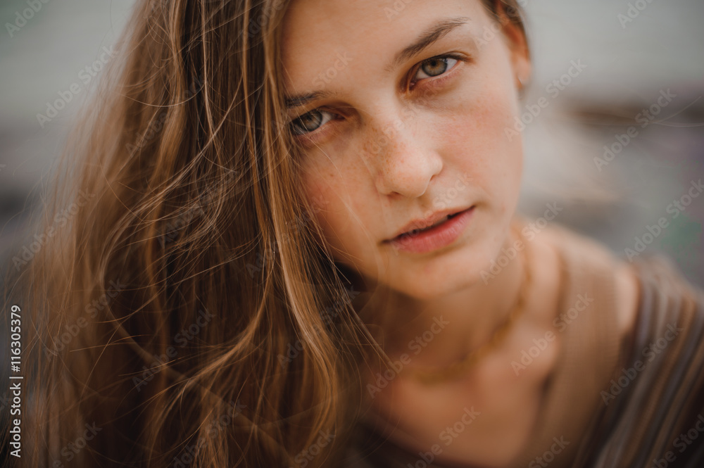 Outdoors portrait of beautiful young girl.
