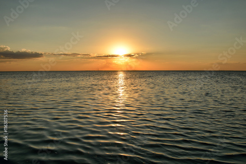 Sunset at sea. variety of colors and hues of the rising sun