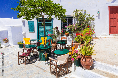 Fototapeta Naklejka Na Ścianę i Meble -  Colors of Greece series - cute bars and tavernas, Amorgos island, Chora village