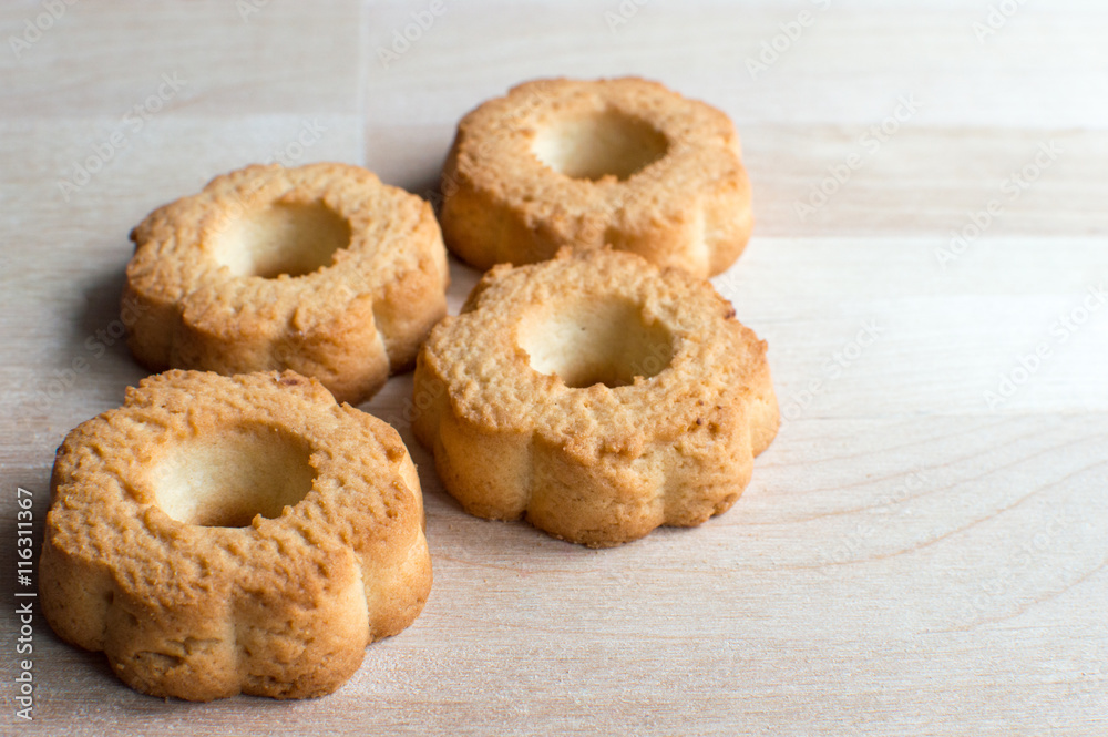 Group of cookies on wooden desk. Closeup bright and nature light