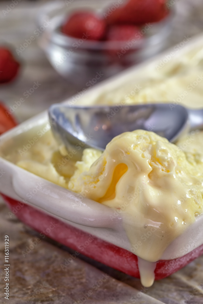 Homemade vanilla ice cream with strawberry Homemade vanilla ice cream with strawberry