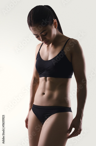 Sexy sport woman posing.  Fitness portrait. Underwear.