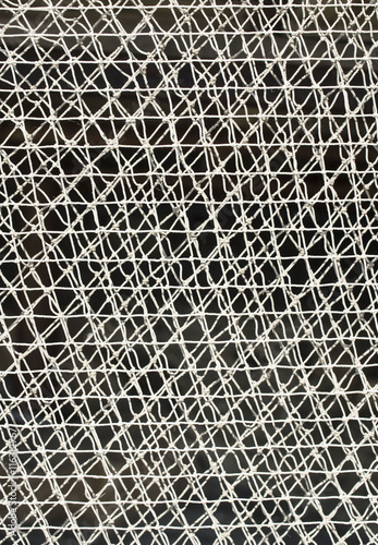 Three fishing nets on black background