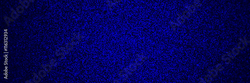 banner with blue glitter on a flat surface with a spotlight and depth of field effect