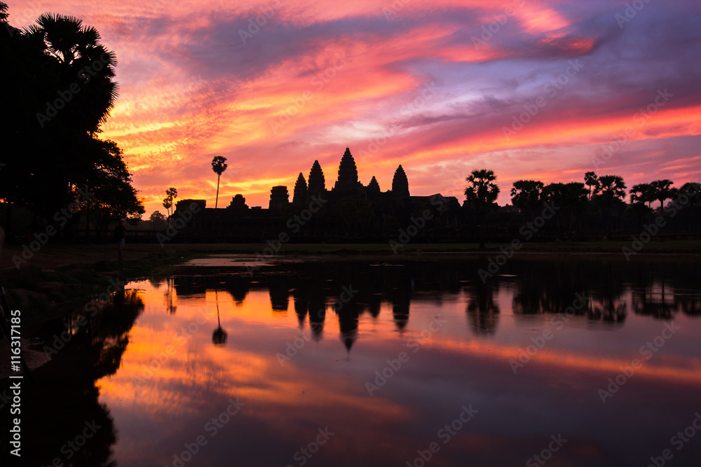 Angkor Wat temple at dramatic sky twilight sunrise
