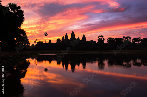 Angkor Wat temple at dramatic sky twilight sunrise