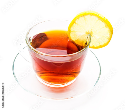 Transparent cup of lemon tea