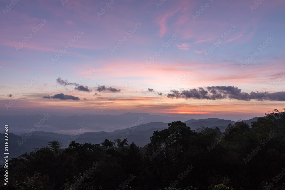 Obraz premium Mountain complex and colorful sky for background.