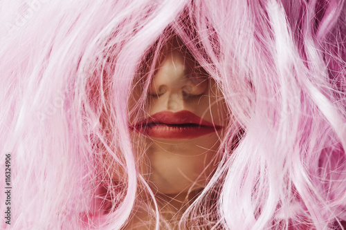 mannequin with a pink wig photo