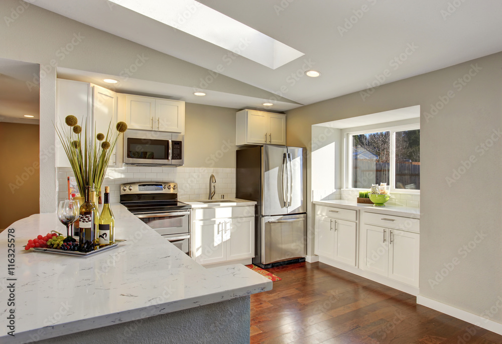 Fototapeta premium Kitchen room interior with white cabinets, hardwood floor