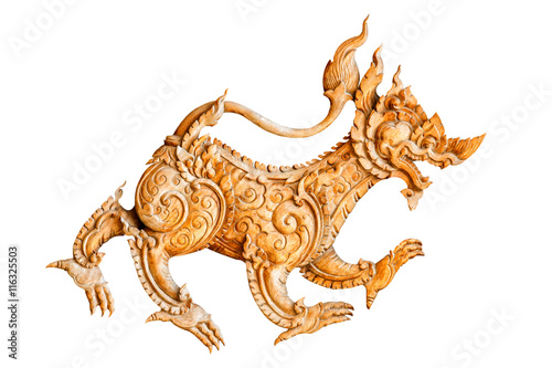 Traditional thai style pattern lion or singha wood carve on white background