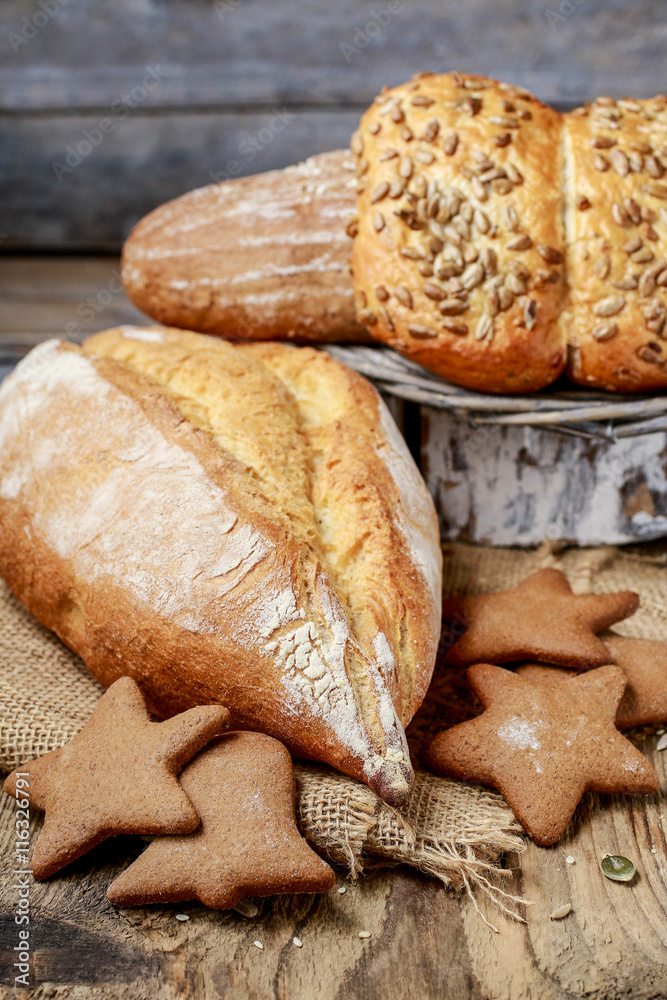 Breads and rolls on wood Breads and rolls on wood