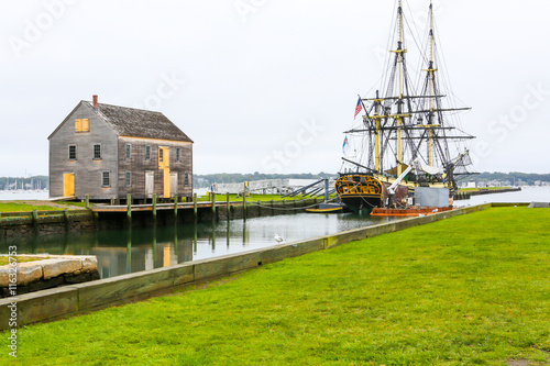 Historic ship named Three-masted Friendship anchored in Salem harbor photo