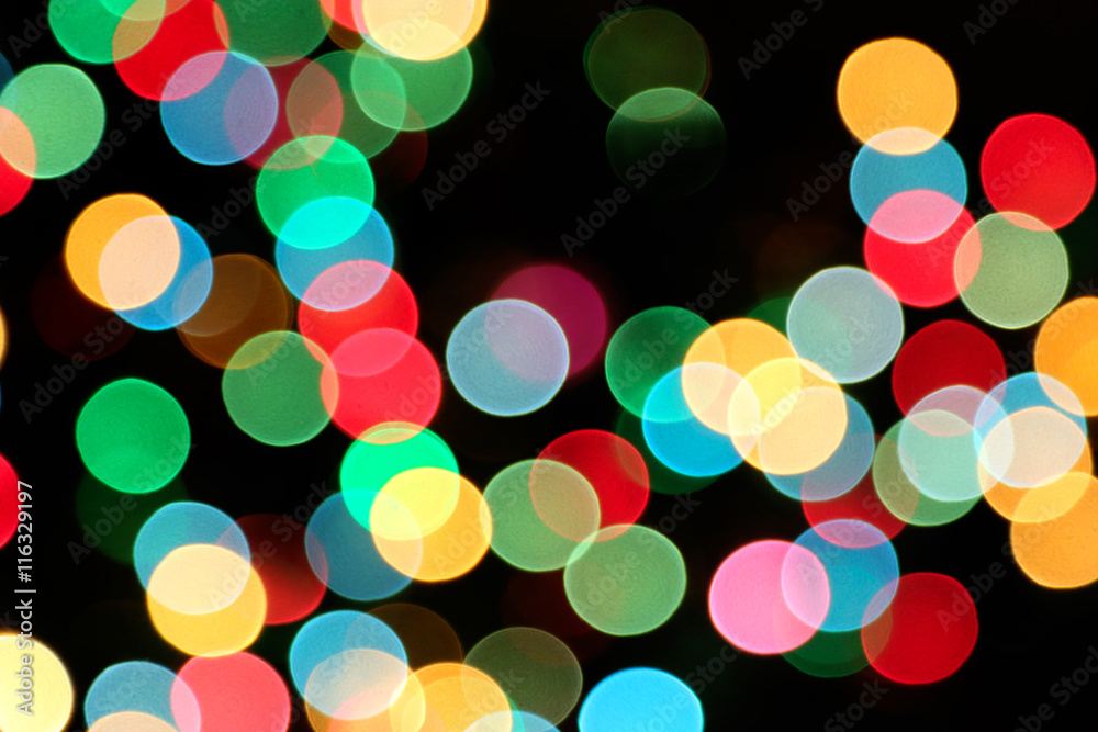 Holiday background with colorful unfocused lights