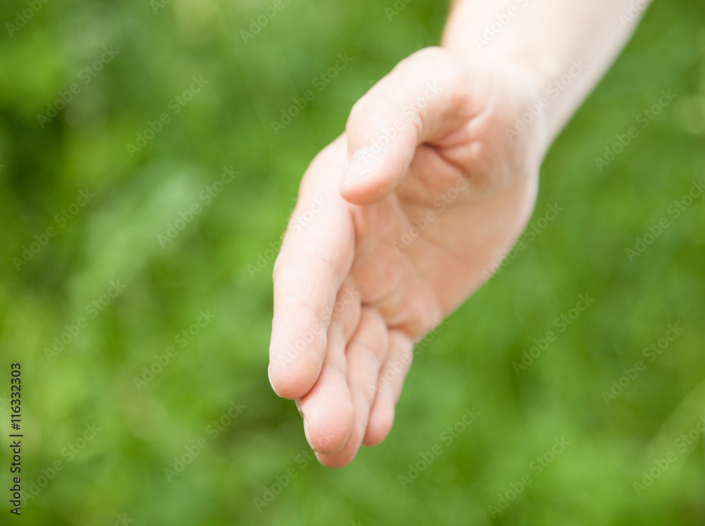 Male hand showing a gesture of a support Male hand showing a gesture of a support