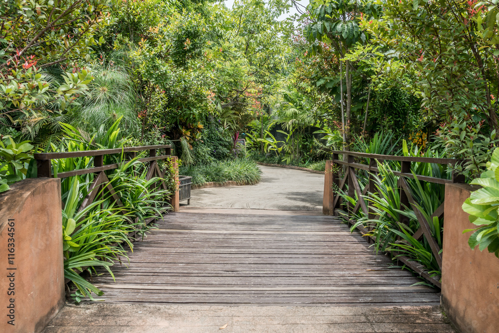 Small wooden bridge in garden Small wooden bridge in garden