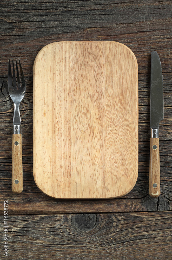 Cutting board and cutlery Cutting board and cutlery