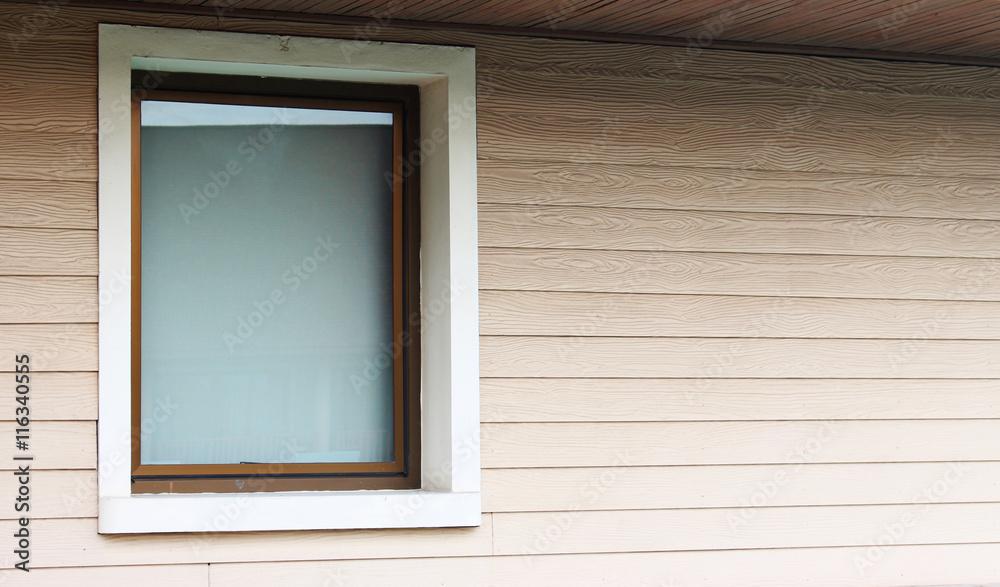 one big window on the wood pattern wall one big window on the wood pattern wall