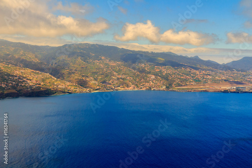 Beautiful aerial view from the plane before landing over Funchal city on Madeira island  Portugal