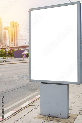 blank billboard on road with city view background