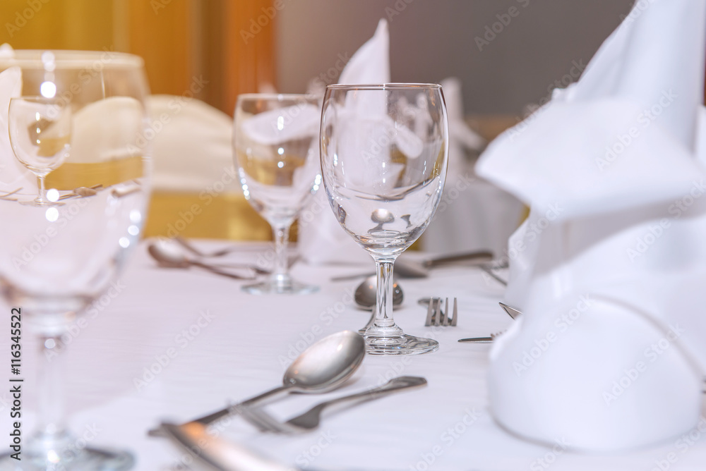 Elegance of glasses on table set up for dinning room Elegance of glasses on table set up for dinning room