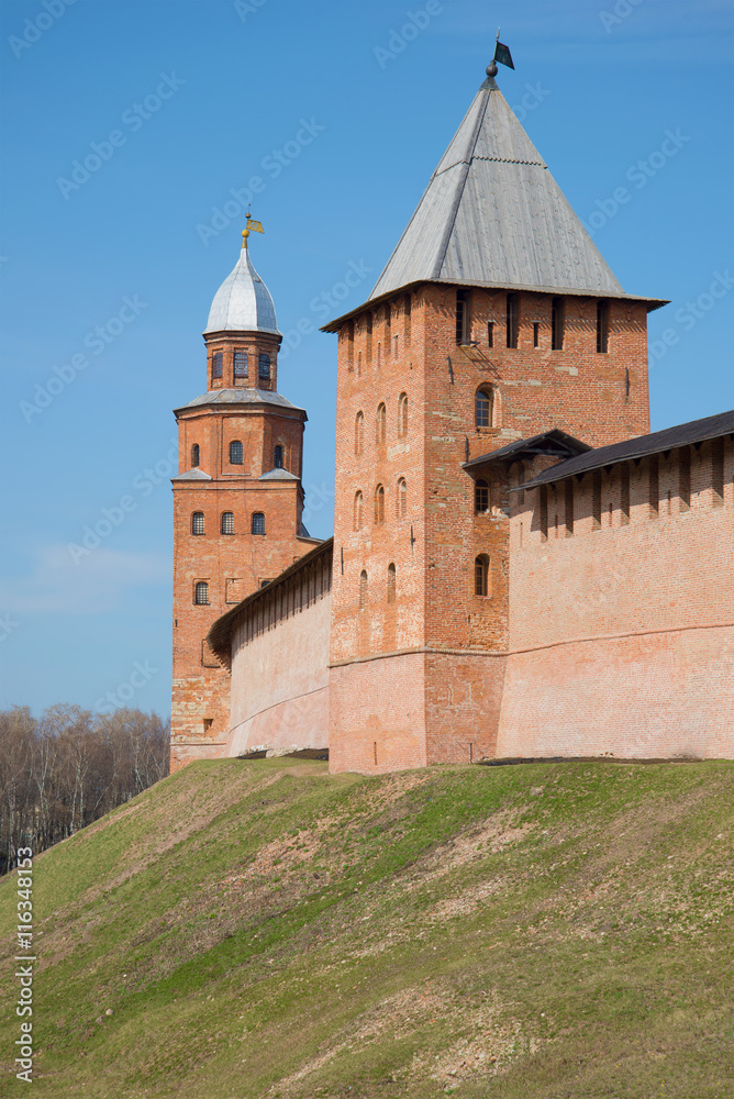 Two ancient towers in the Novgorod fortress close up, sunny april day. Veliky Novgorod, Russia