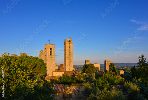 San Gimignano, Italy, is a small walled medieval hill town in the province of Siena, Tuscany. Known as the Town of Fine Towers, is famous for its medieval architecture.