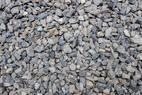 Background of black and white stone on the ground