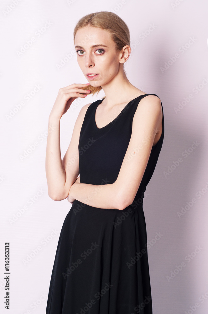 Portrait of a sophisticated girl in the black dress Portrait of a sophisticated girl in the black dress